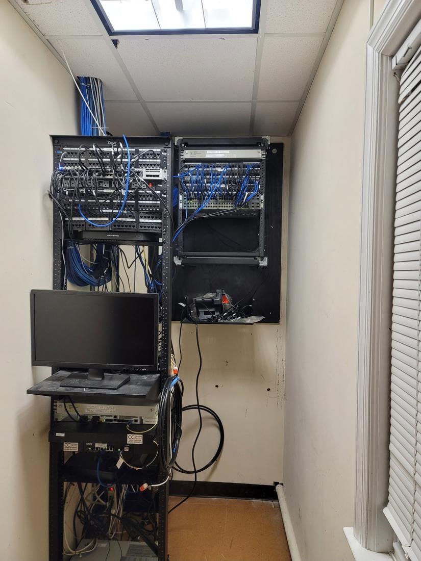 After: Office network closet: re-patched, labeled, and cleaned up